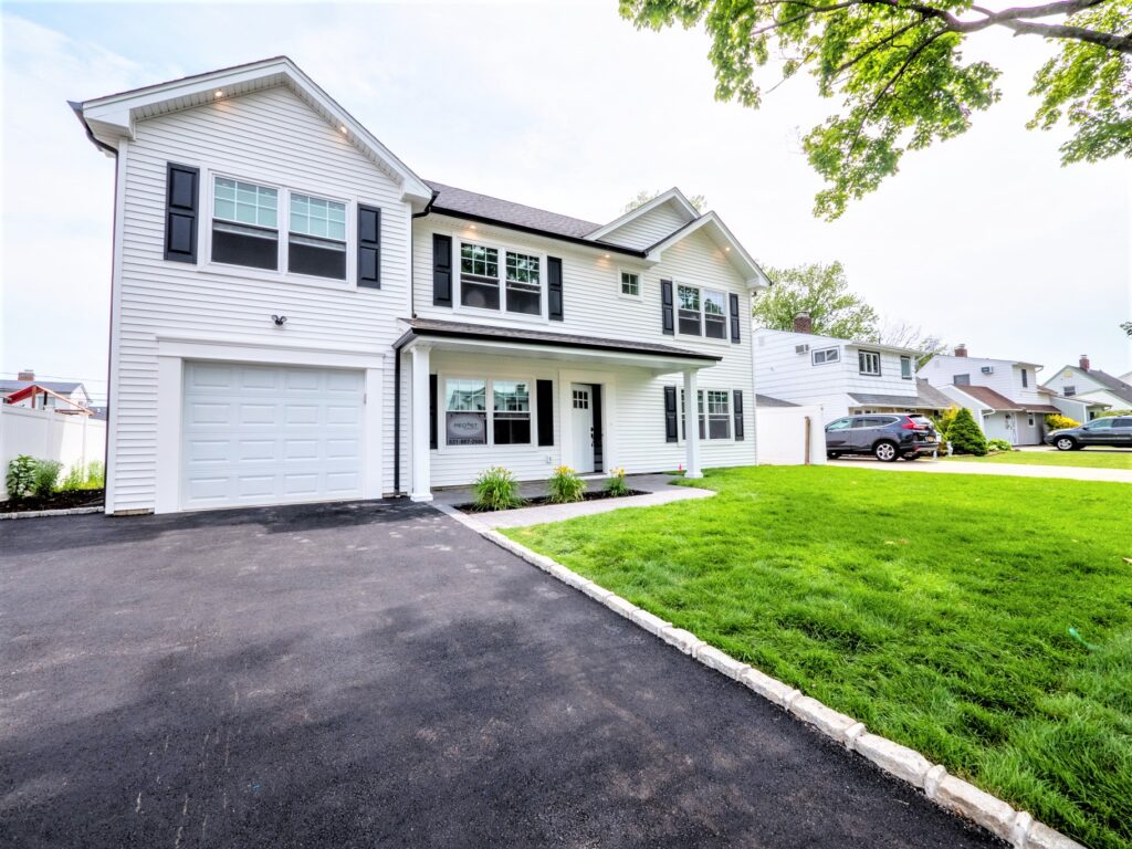 Modern white two-story home upgraded by trusted Long Beach general contractors