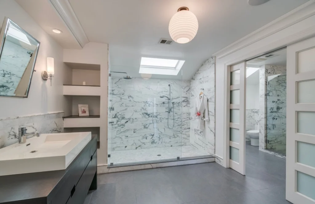 Glass shower bathroom with skylight and modern design - bathroom remodel Long Beach NY