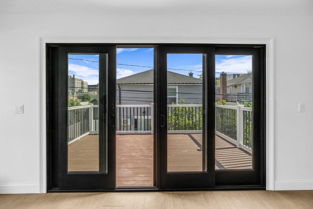 Glass patio sliding door installed by Long Beach NY screen and sliding door repair team