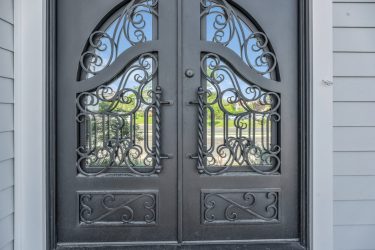 Custom wrought iron entry doors installed by Long Beach NY door company